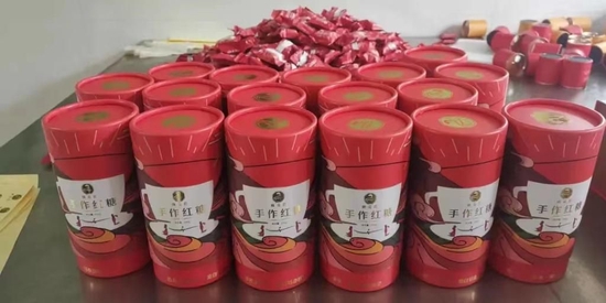  圖為潢溪鎮(zhèn)打造的紅糖品牌“曉花匠”。新華社記者袁慧晶攝